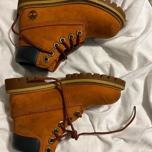 Burnt orange 9t timberlands great for hiking or outdoor play soles are like new